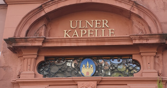 Red sandstone roof over the portal of the Ulner Chapel